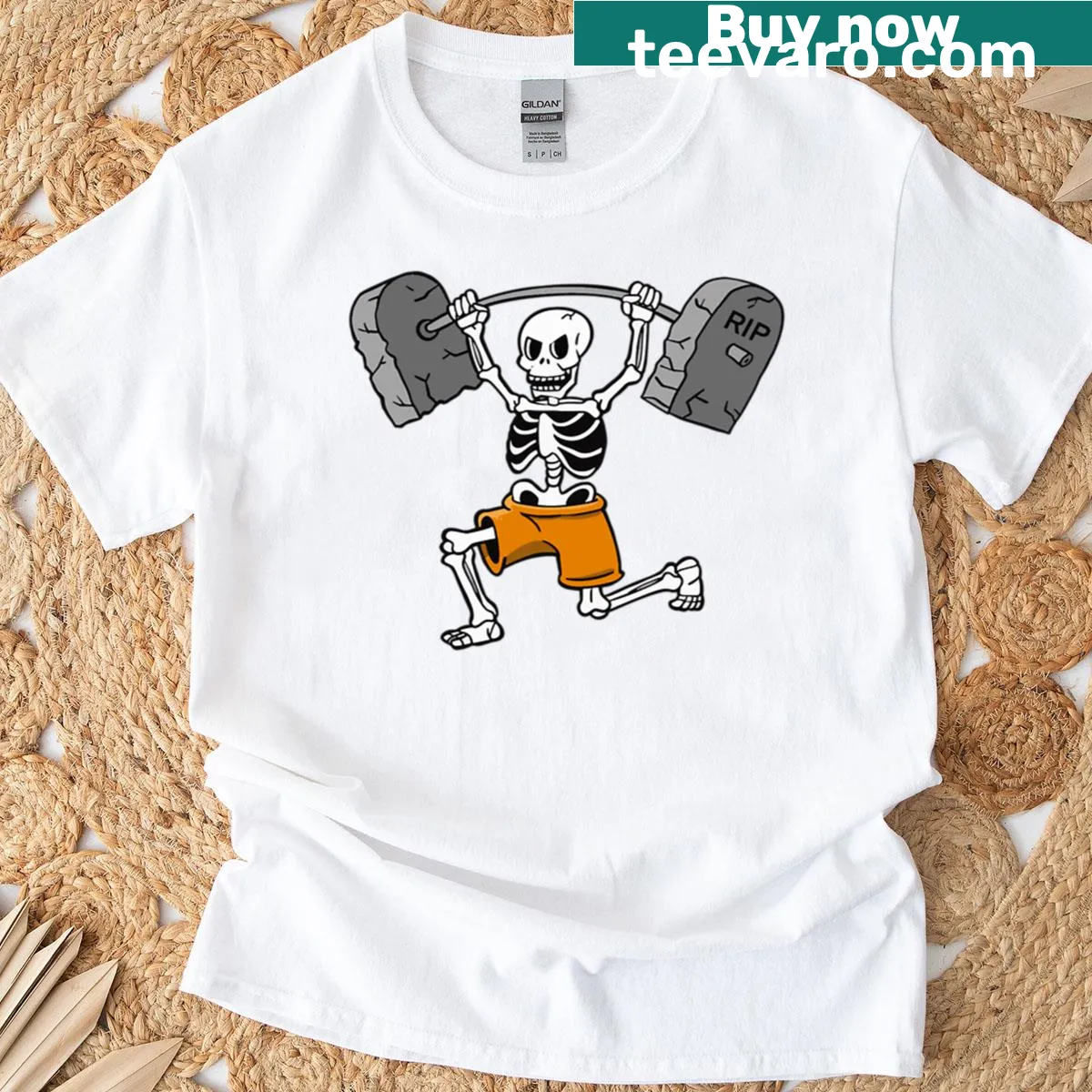 Humorous skeleton lifting tombstones in Halloween graphic — on a men's t-shirt