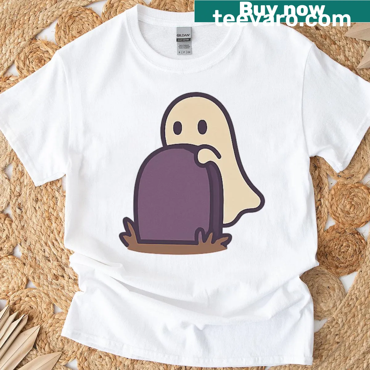 Ghost in a graveyard graphic on an oversized Halloween T-shirt — on a men's t-shirt