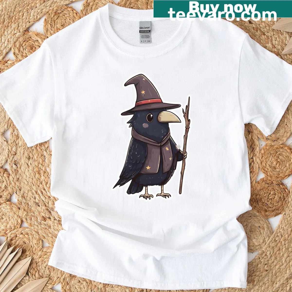Gothic t-shirt featuring an illustrated crow in a mystical design. — on a men's t-shirt