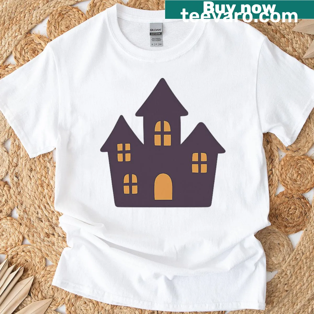 Vintage haunted house graphic for Halloween T-shirt — on a men's t-shirt