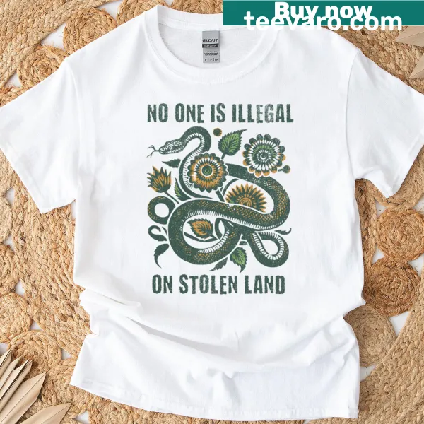 T-shirt with bold text advocating for immigrant rights and social justice
