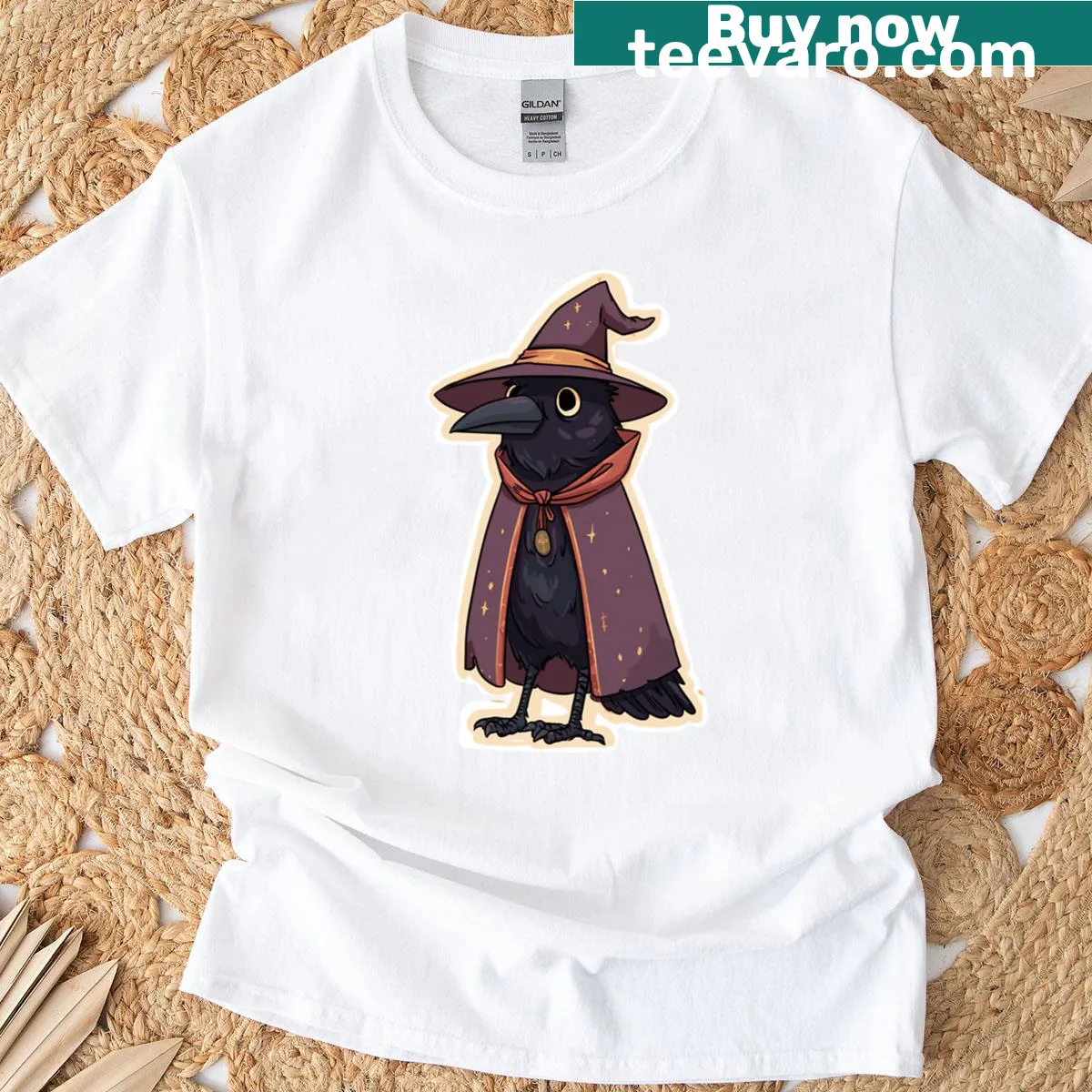 T-shirt featuring an illustrated mystical crow with magical elements — on a men's t-shirt