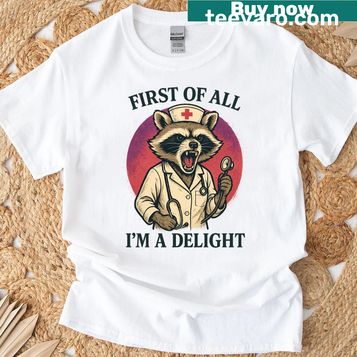 Cute raccoon nurse graphic t-shirt with humorous text — on a men's t-shirt