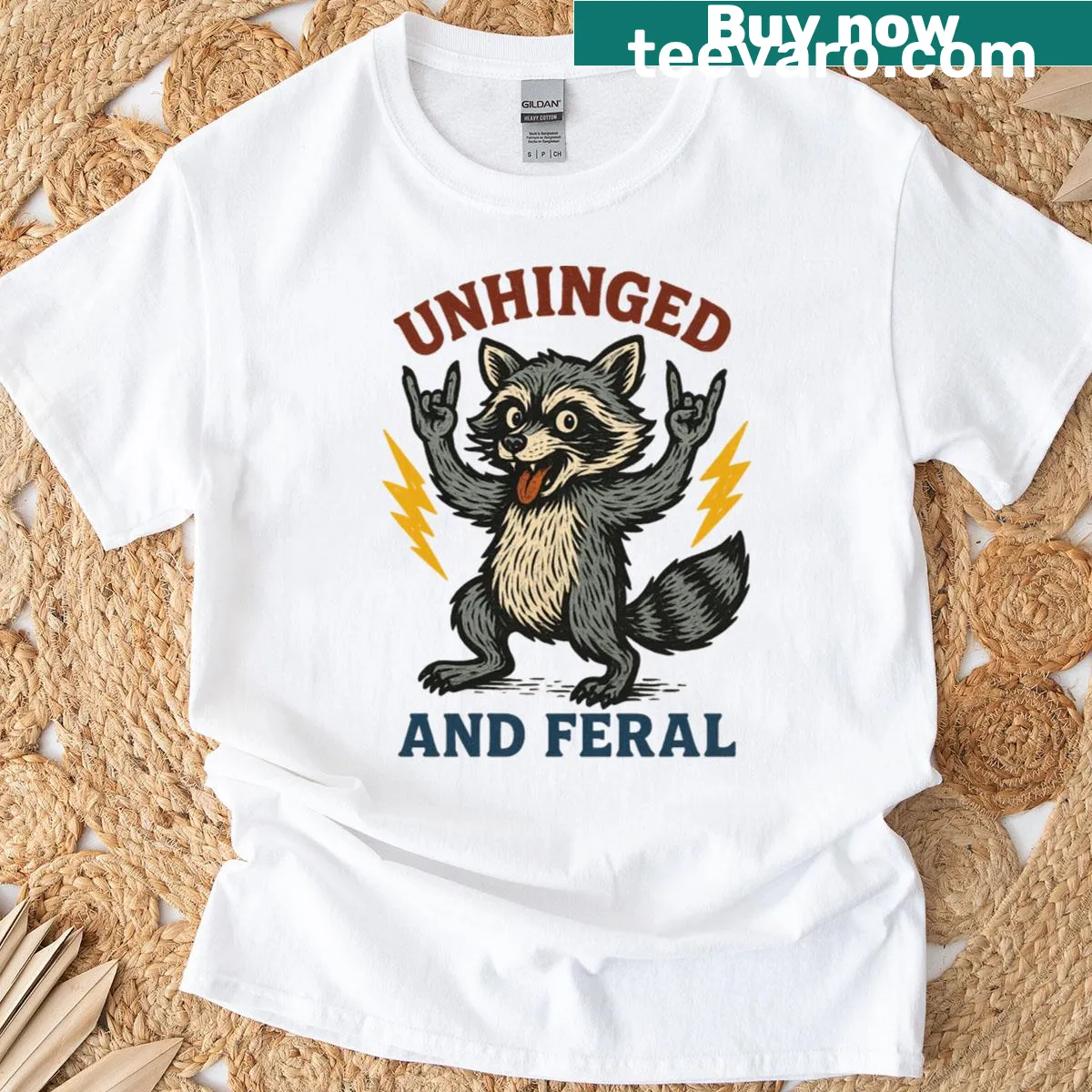 Cartoon raccoon graphic with chaotic energy on T-shirt — on a men's t-shirt