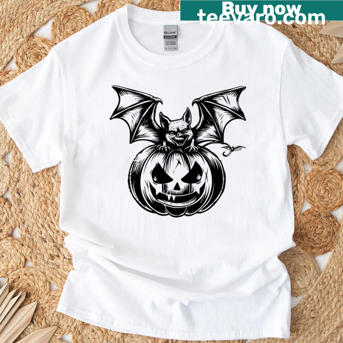 Halloween themed T-shirt featuring a bat and jack-o'-lantern — on a men's t-shirt