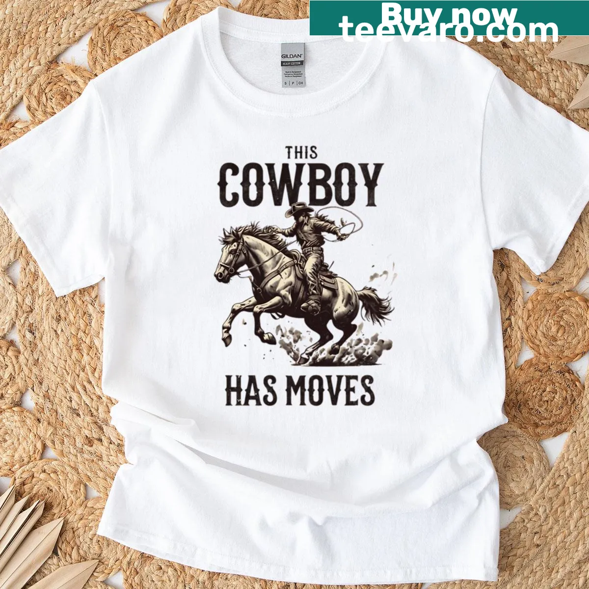 Illustrative cowboy and horse graphic on an oversized t-shirt — on a men's t-shirt