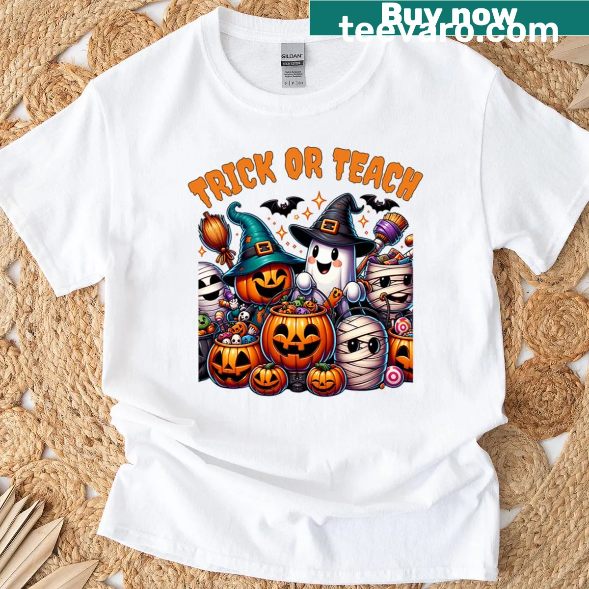 Cute Halloween teacher t-shirt with ghost and pumpkin design — on a men's t-shirt