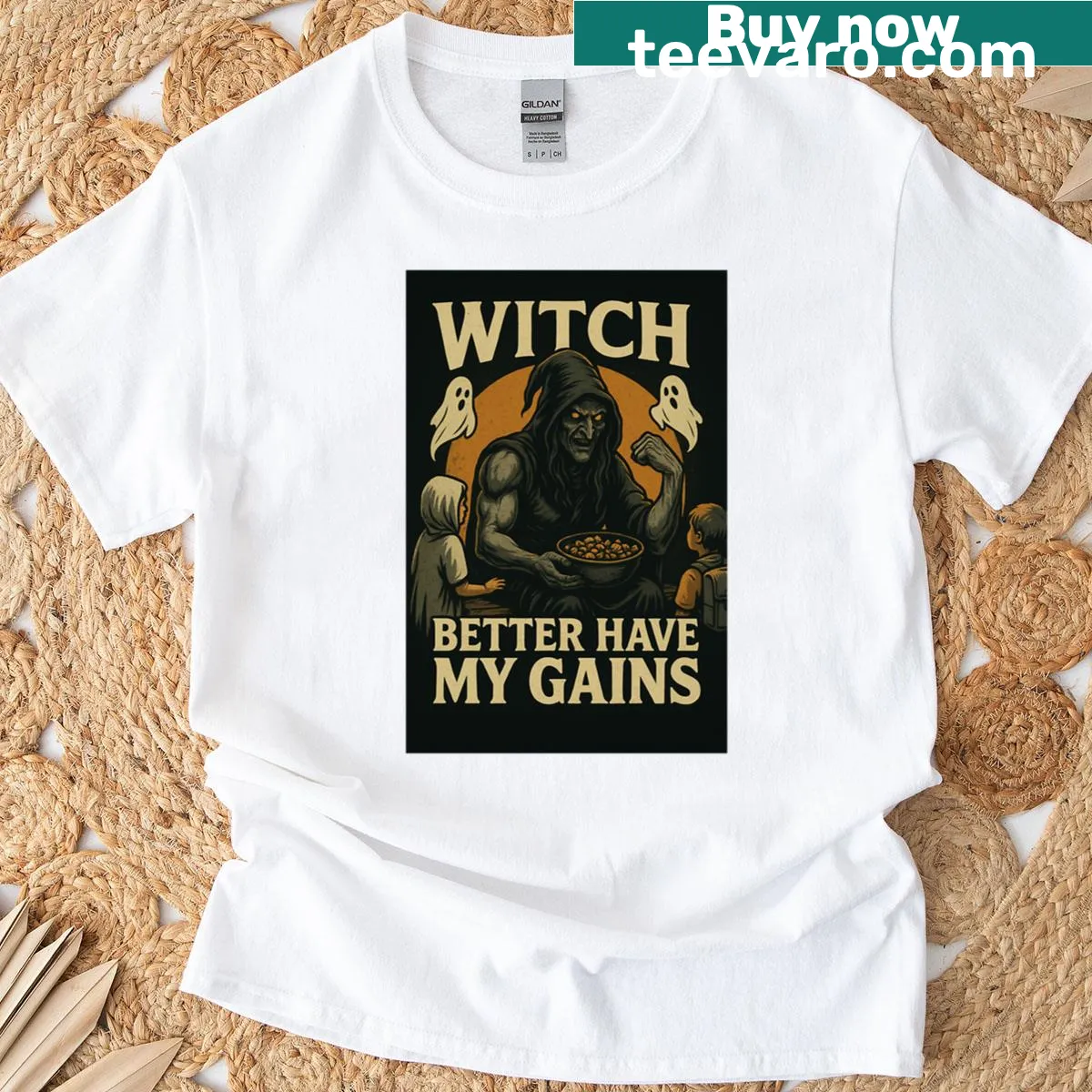 Oversized T-shirt showing a witch coven silhouette design — on a men's t-shirt
