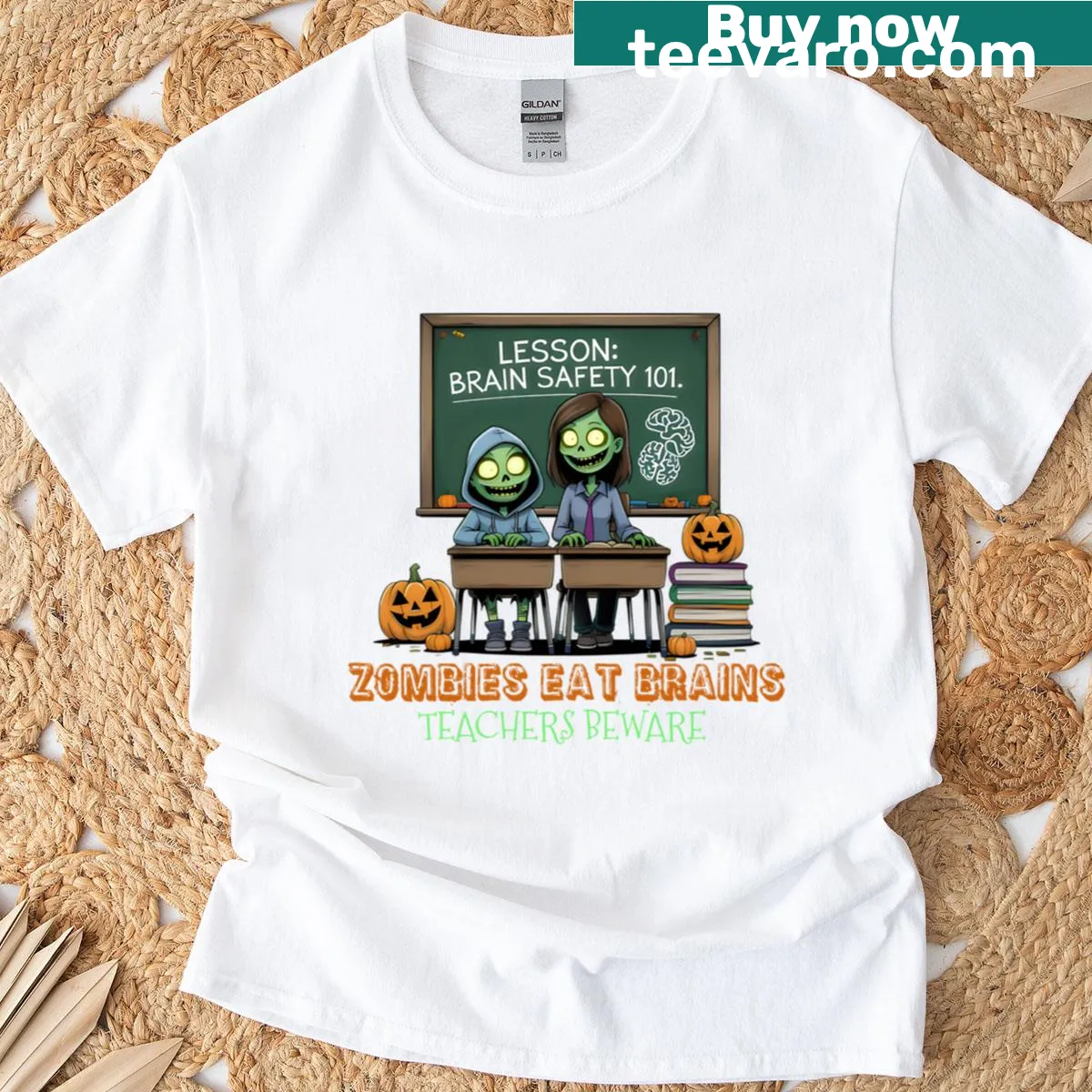 Funny T-shirt with the phrase Zombies Eat Brains Teachers Beware — on a men's t-shirt