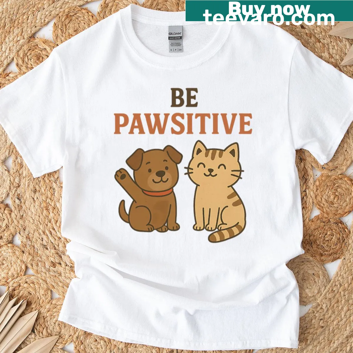 Uplifting t-shirt with 'Be Pawsitive' message — on a men's t-shirt