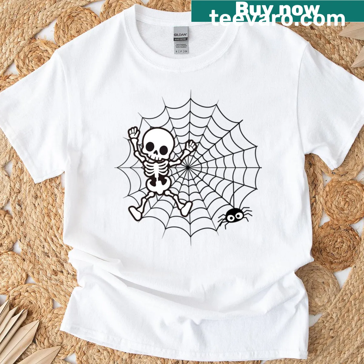 Dancing skeleton graphic in spiderweb for kids' Halloween T-shirt — on a men's t-shirt