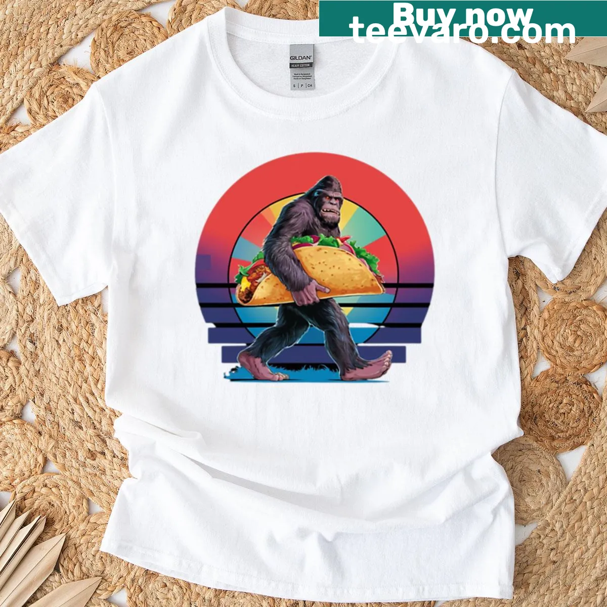Funny illustration of Bigfoot holding a taco on a t-shirt — on a men's t-shirt