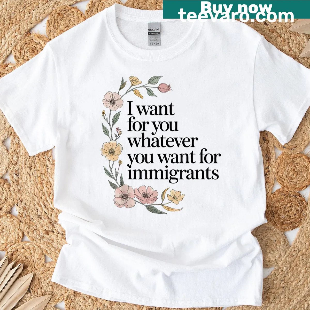 Activism T-shirt with floral design supporting immigrants — on a men's t-shirt