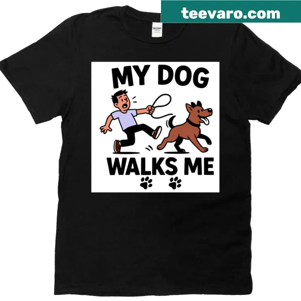 Oversized t-shirt with humorous text 'My Dog Walks Me'