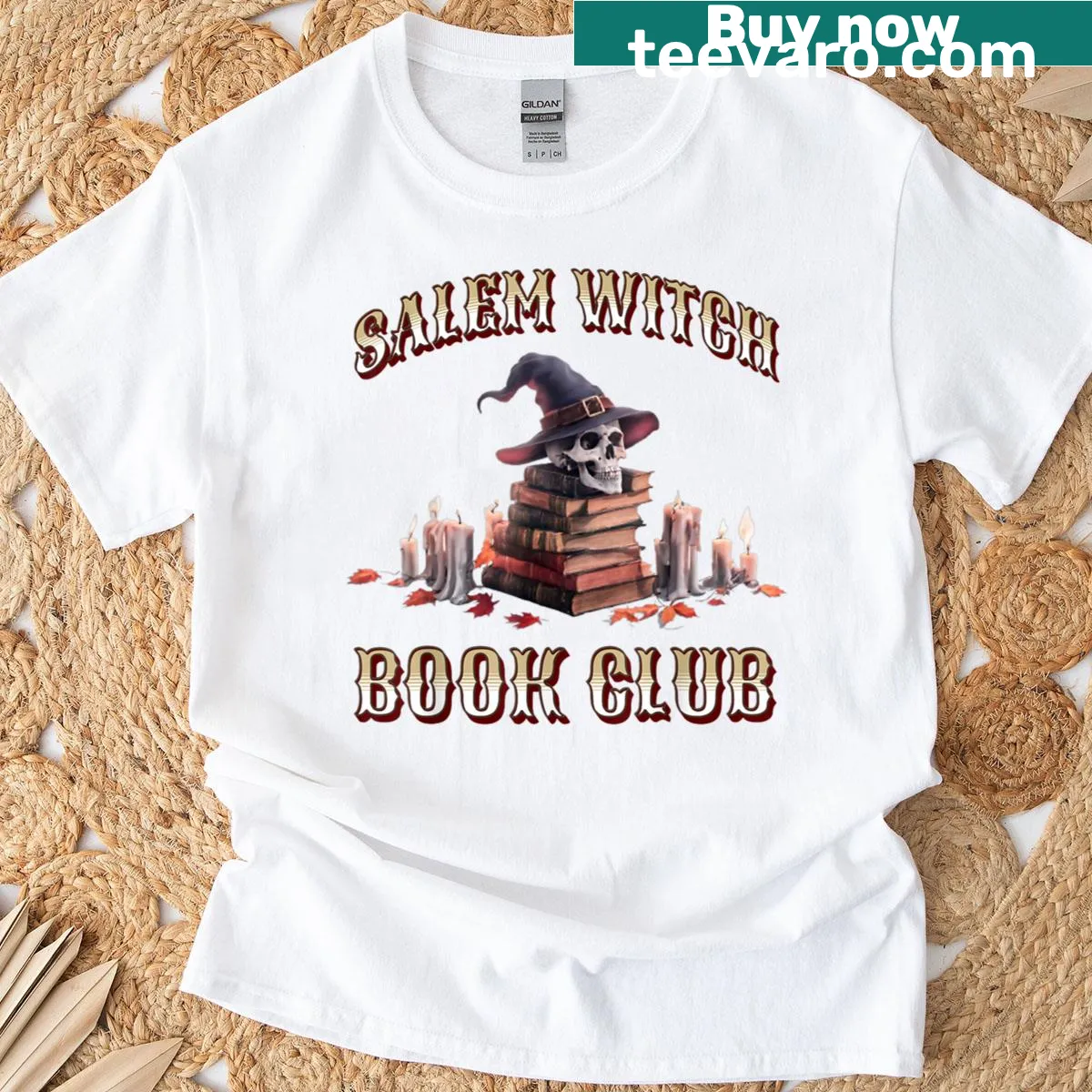 Raccoon witch reading a book on a Halloween-themed T-shirt — on a men's t-shirt
