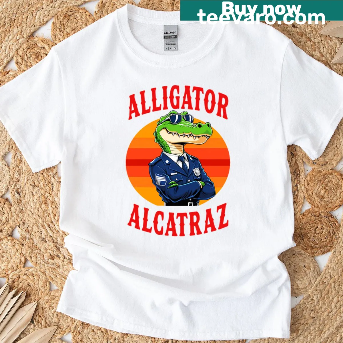 Oversized t-shirt featuring an alligator and Alcatraz theme illustration — on a men's t-shirt