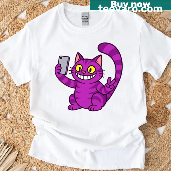 Oversized t-shirt featuring a playful Cheshire Cat selfie design for kids.
