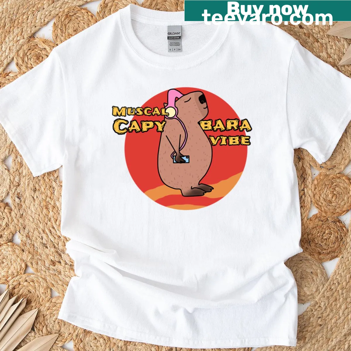 T-shirt featuring a playful graphic of capybaras enjoying music. — on a men's t-shirt