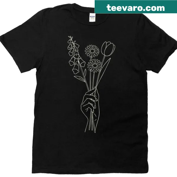 Minimalist floral T-shirt with foxglove, daisy, and tulip illustrations.