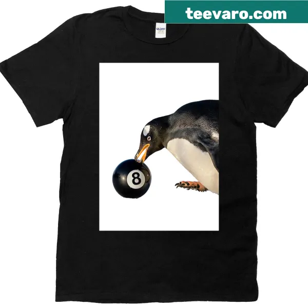 Playful penguin graphic with an 8 ball on a T-shirt