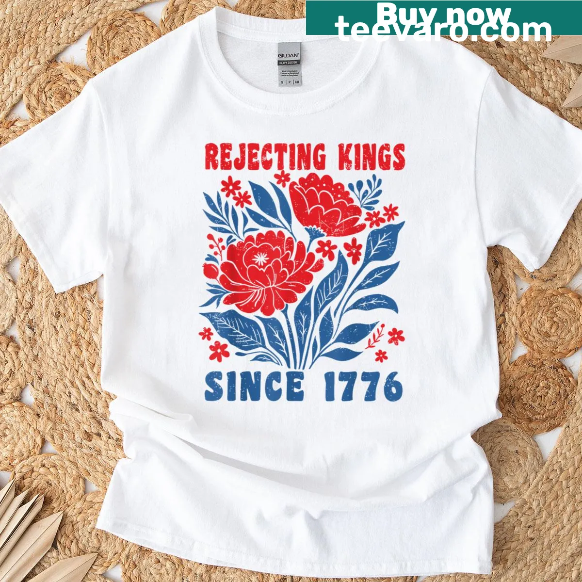 Retro T-shirt with floral design and 'Rejecting Kings Since 1776' text — on a men's t-shirt