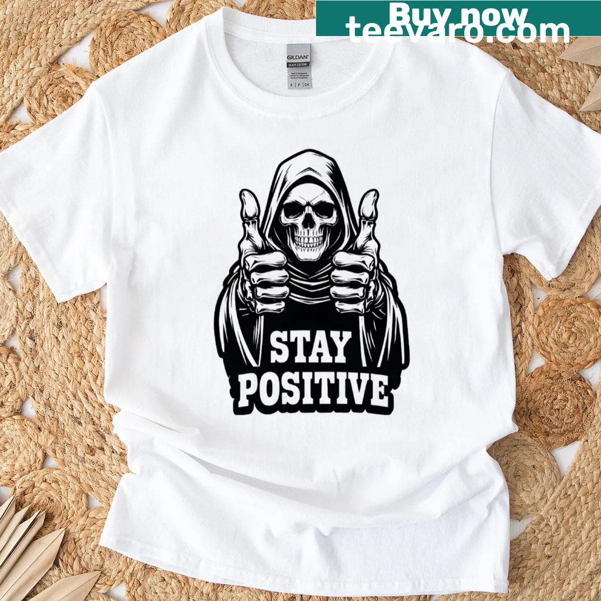 Grim Reaper skeleton design with 'Stay Positive' text in humorous style — on a men's t-shirt