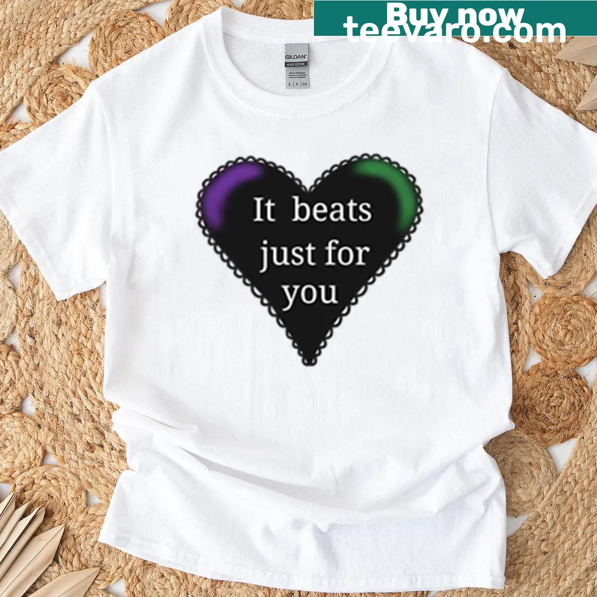 Minimalist black heart t-shirt design — on a men's t-shirt
