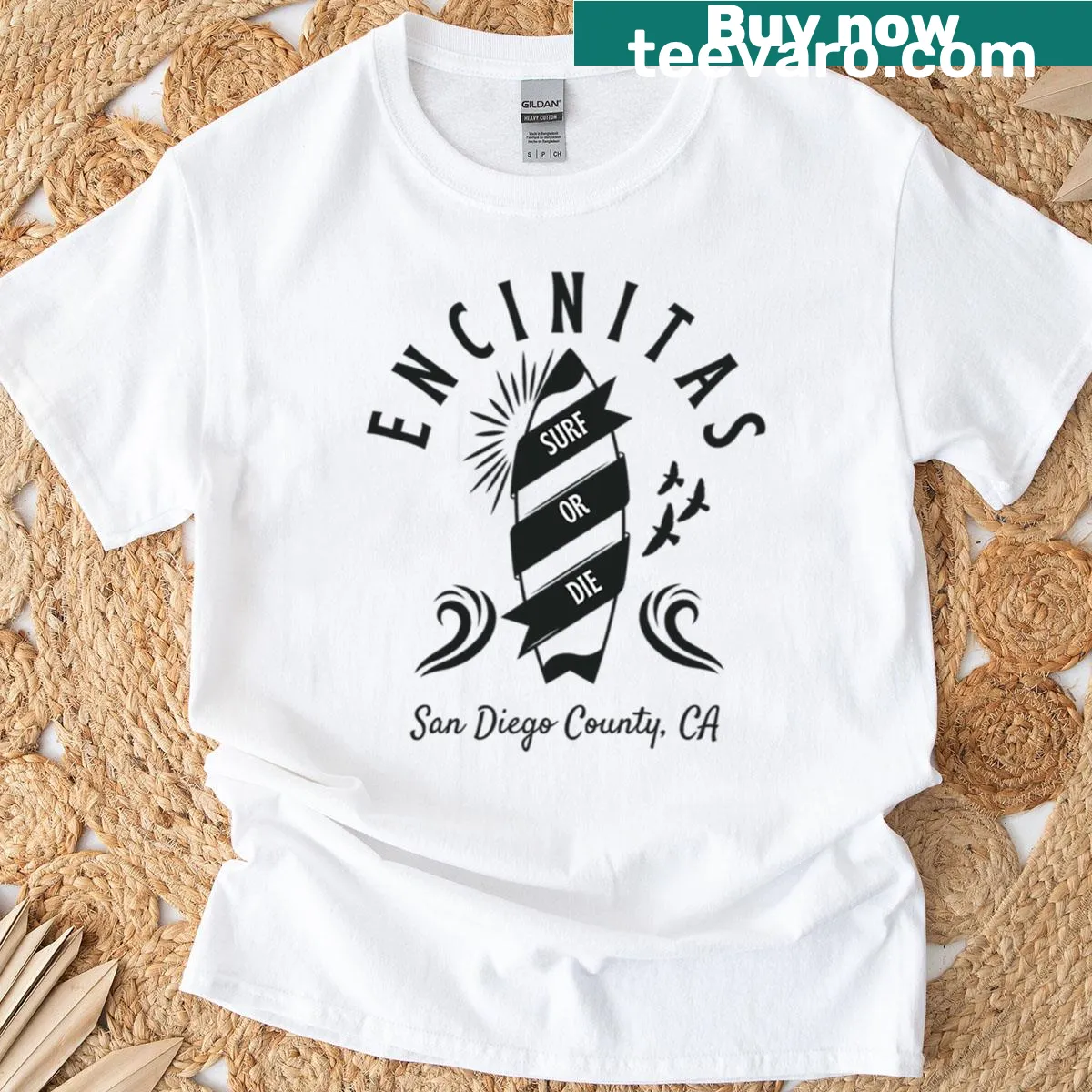 Vintage-style black t-shirt with surfboard graphic related to Encinitas — on a men's t-shirt