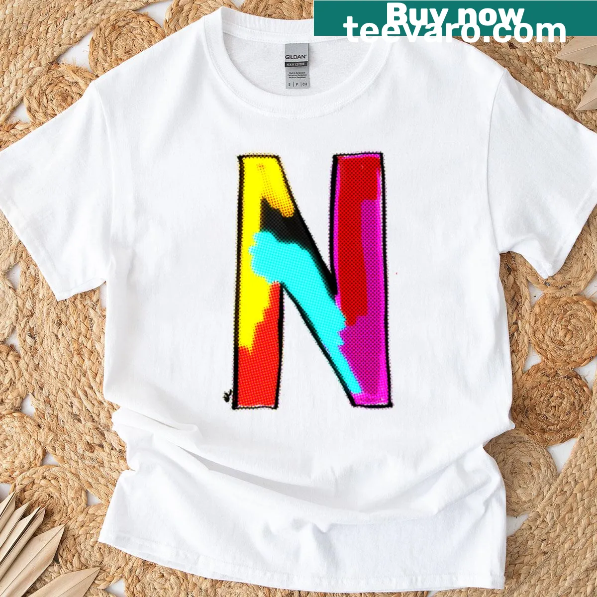 Minimalist T-shirt featuring the letter N in bold typography. — on a men's t-shirt