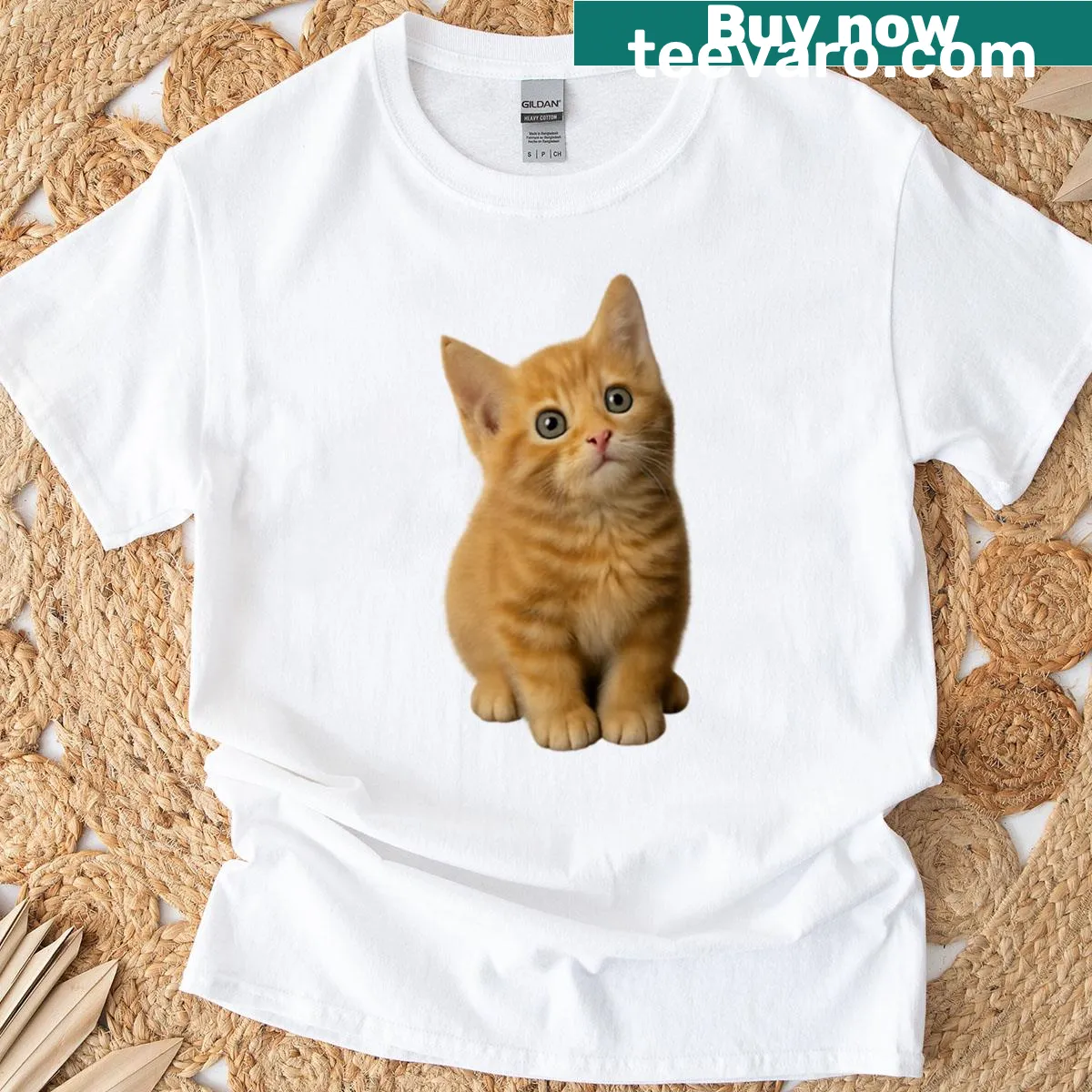 T-shirt featuring an illustration of an adorable orange tabby kitten — on a men's t-shirt