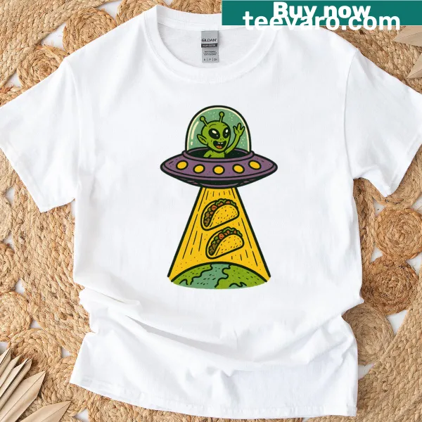 Whimsical t-shirt showing aliens arriving on Earth for tacos