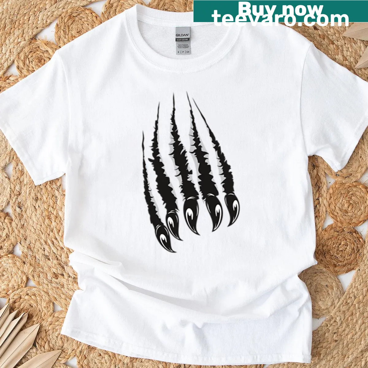 Black oversized t-shirt with abstract grizzly bear paw graphic. — on a men's t-shirt