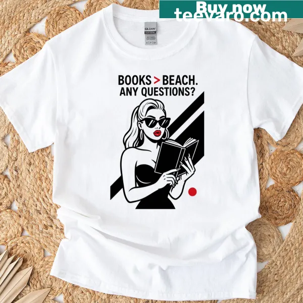Funny t-shirt with a girl reading and text 'Books Over Beach'.