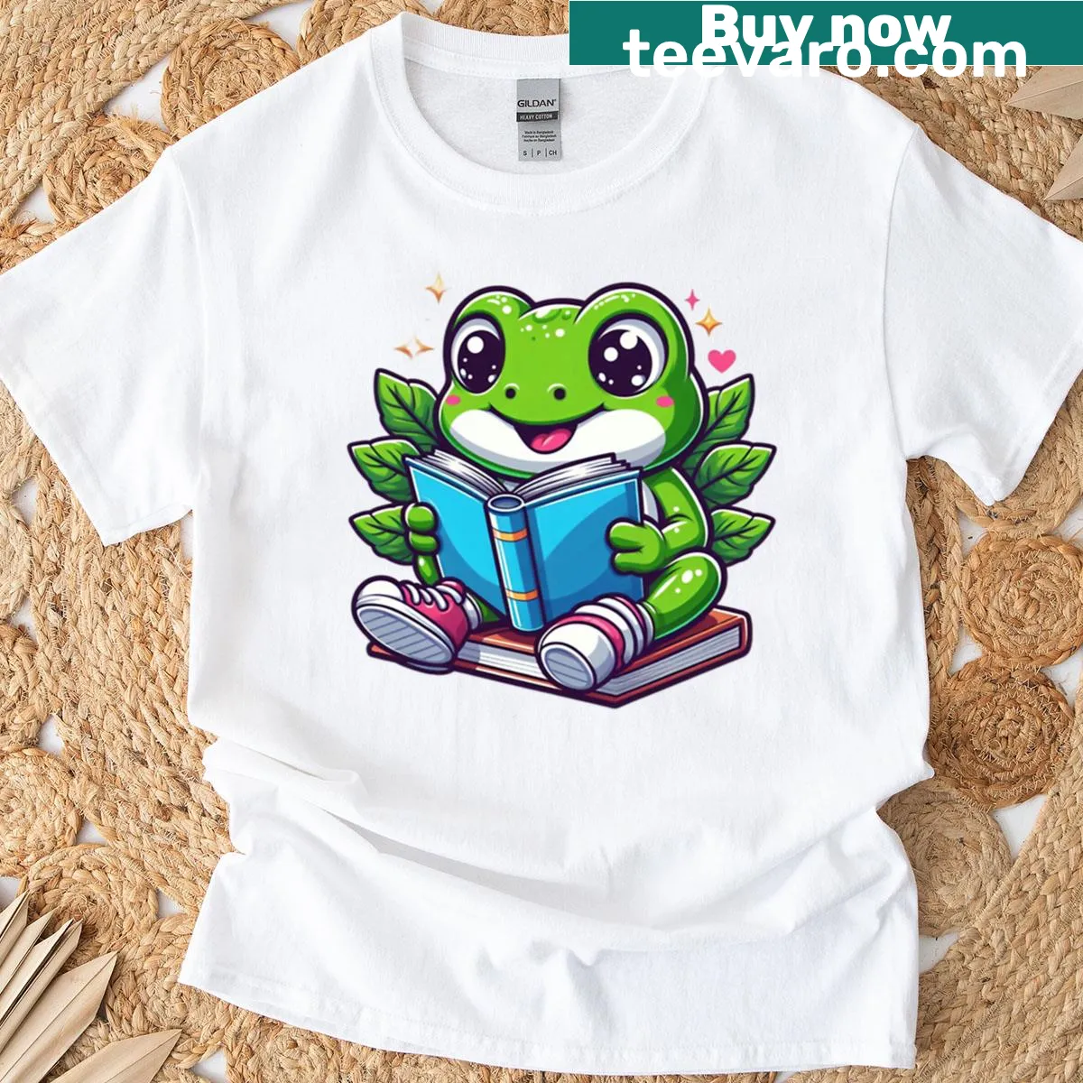 Cartoon frog reading a book design on a t-shirt — on a men's t-shirt