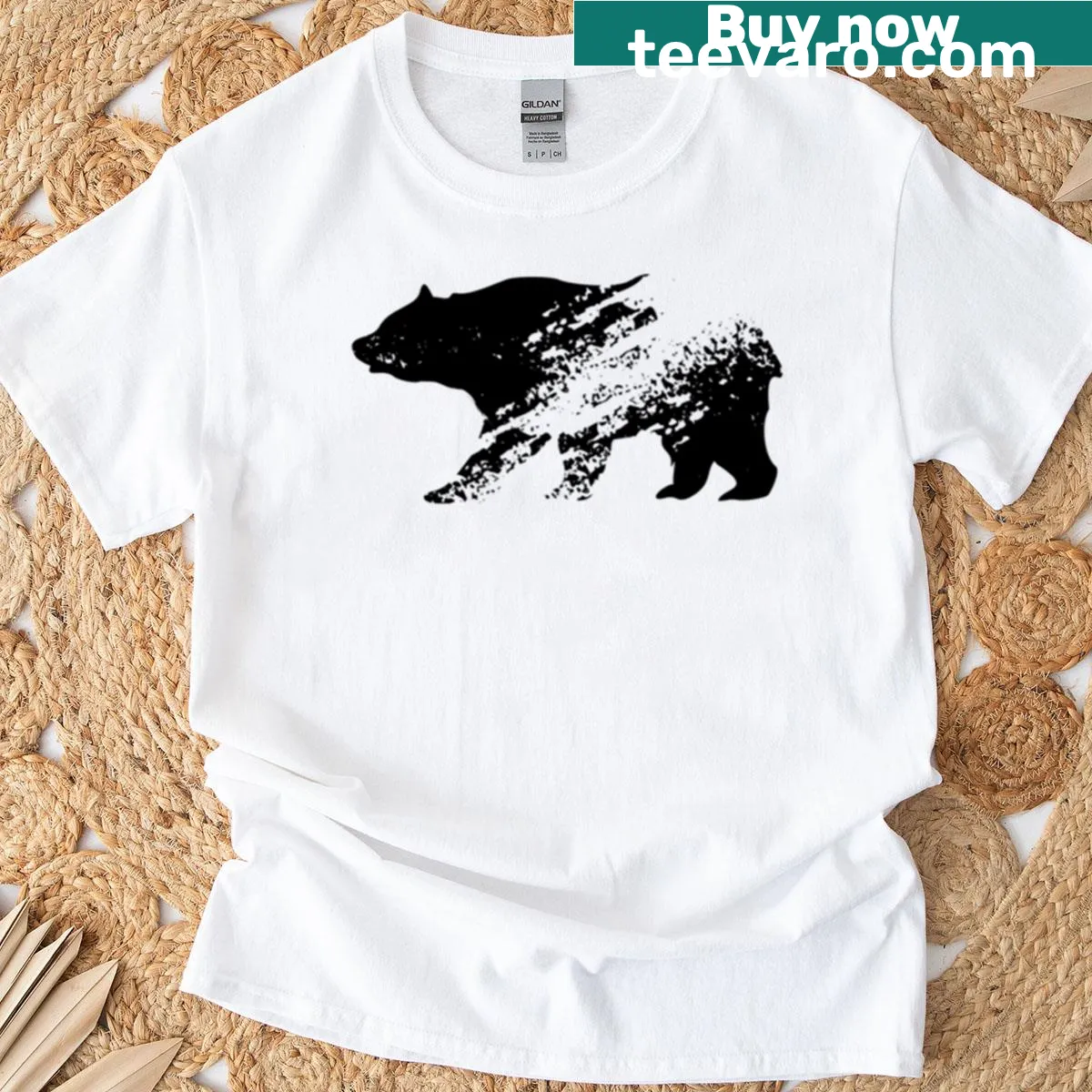 Minimalist t-shirt with a faded black abstract grizzly bear graphic — on a men's t-shirt
