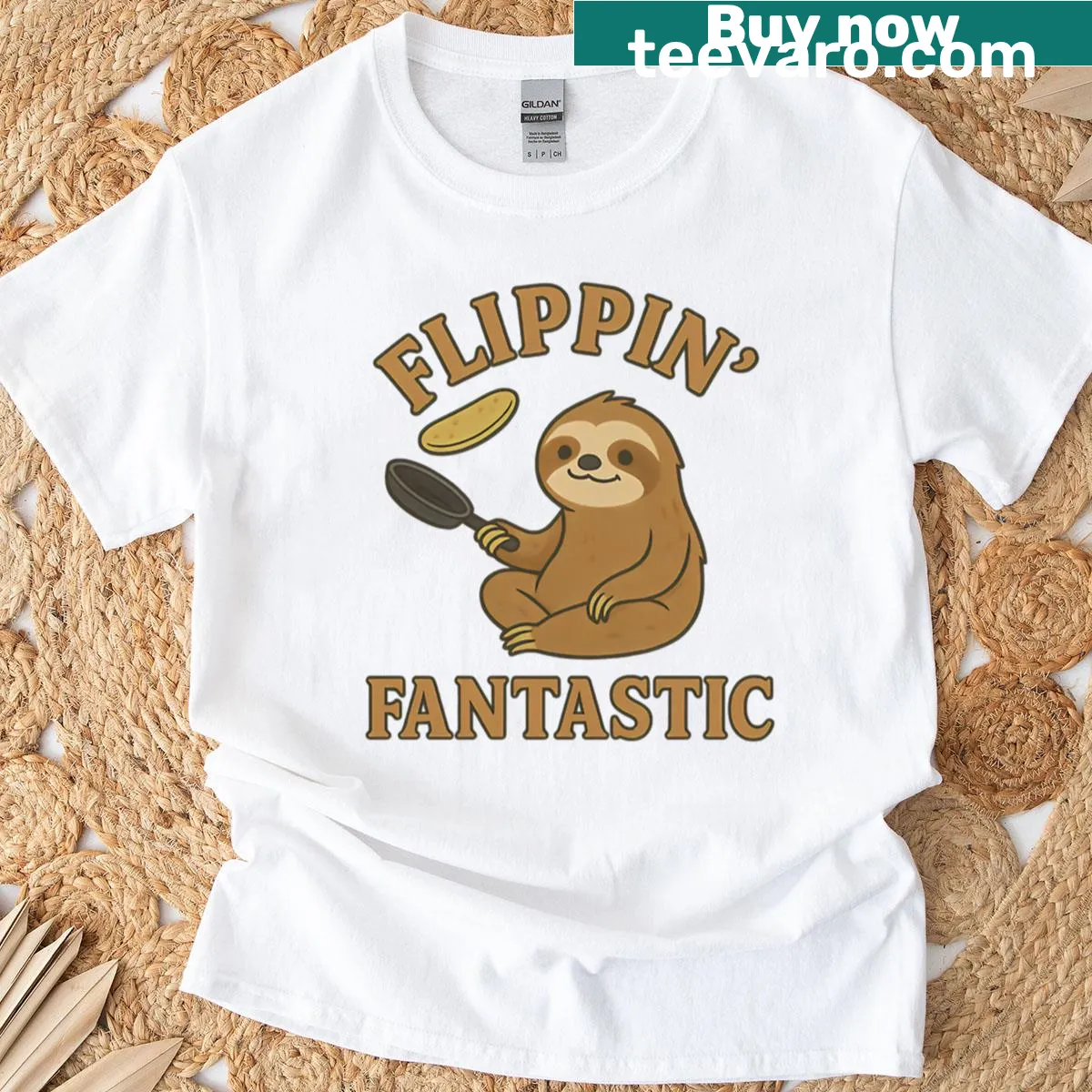 Relaxed sloth graphic flipping pancakes for a humorous vibe — on a men's t-shirt