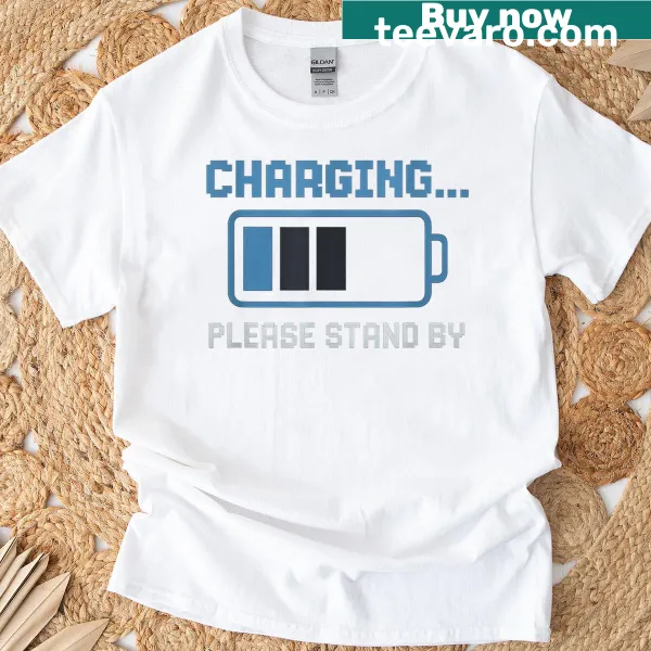 T-shirt featuring a battery icon and 'Please Stand By' text for gamers