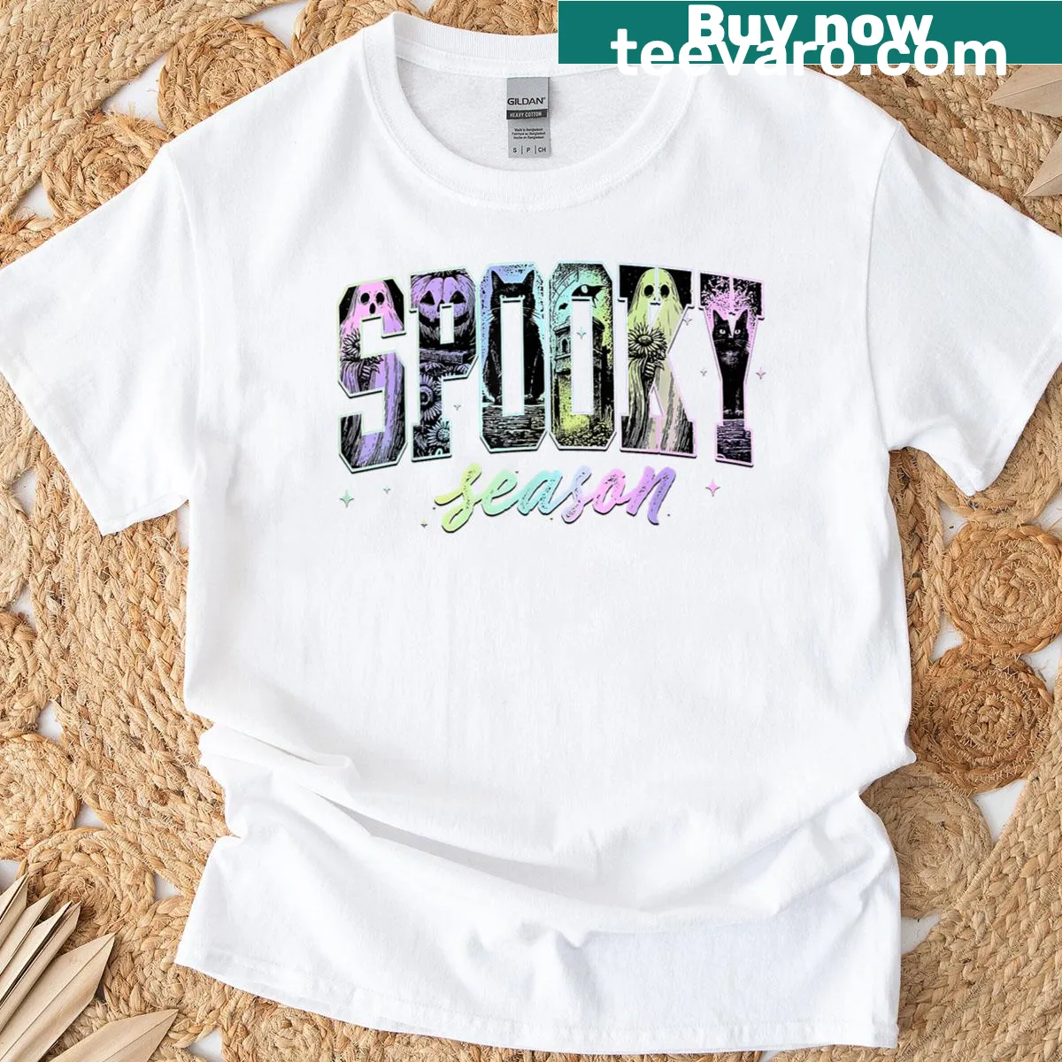 Halloween-themed t-shirt featuring ghosts, pumpkins, and cats — on a men's t-shirt