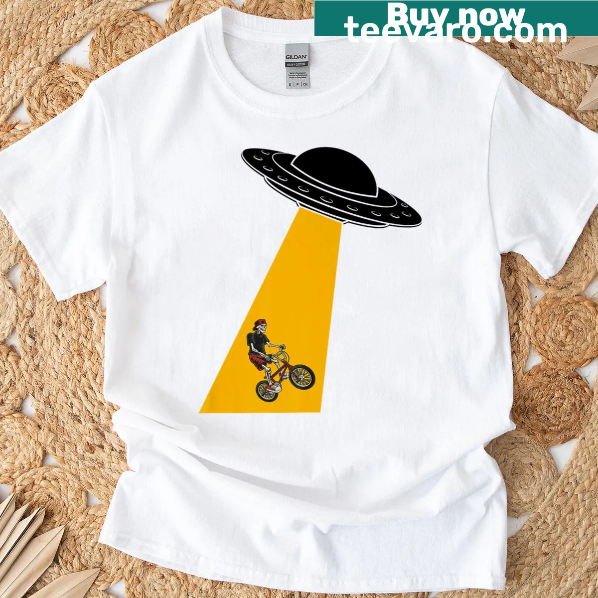 BMX skeleton UFO rider with aliens graphic on T-shirt — on a men's t-shirt