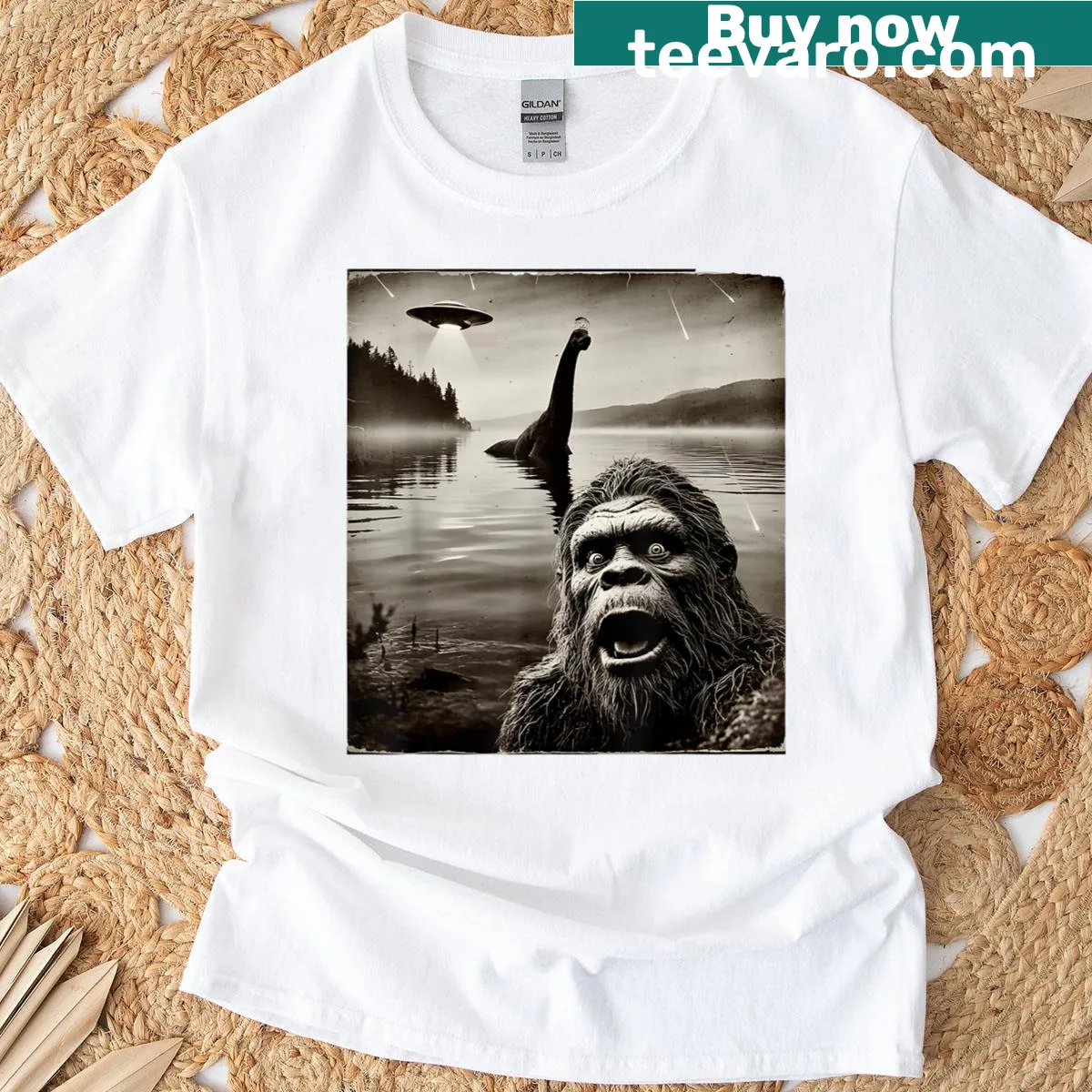 Funny graphic of Bigfoot with Loch Ness Monster and UFOs on a T-shirt. — on a men's t-shirt