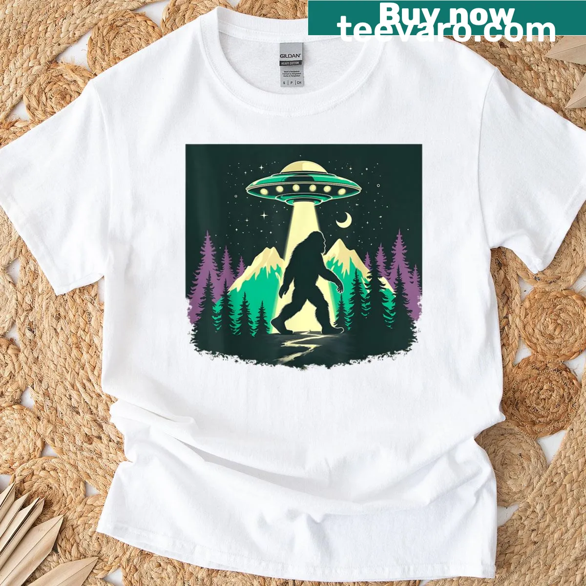 Graphic of a dinosaur being abducted by a UFO on a t-shirt — on a men's t-shirt