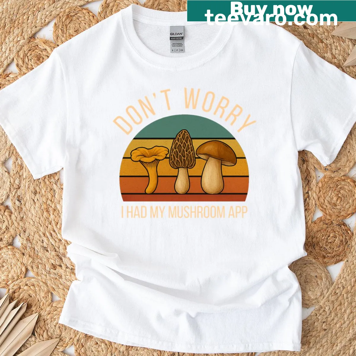 Whimsical graphic of various mushrooms on a t-shirt — on a men's t-shirt