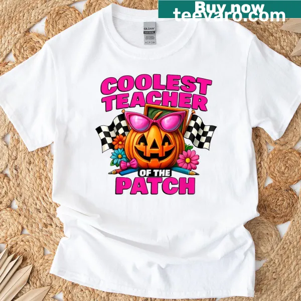 Illustrated Halloween pumpkin design on a teacher T-shirt.