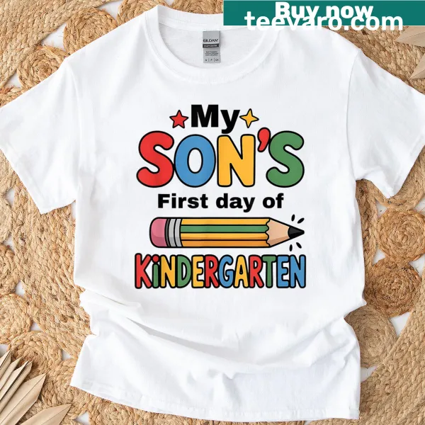 Funny T-shirt celebrating a child's first day of kindergarten with playful text.
