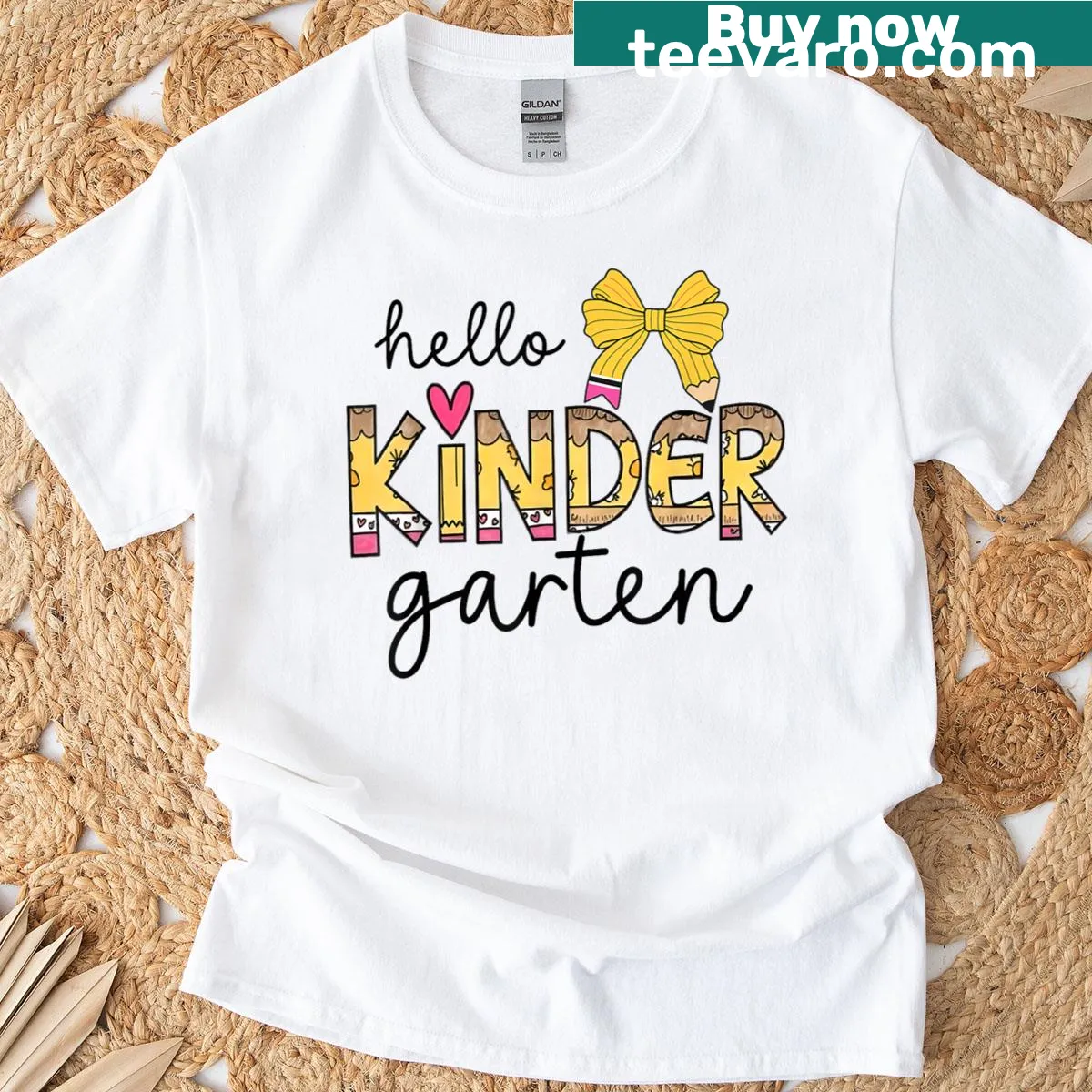 Whimsical kindergarten teacher graphic with bows and pencils — on a men's t-shirt