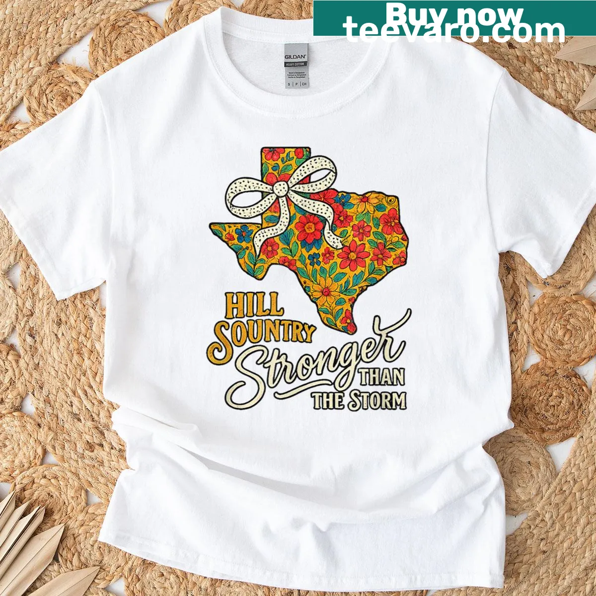 Artistic t-shirt depicting Texas Hill Country spirit and resilience — on a men's t-shirt