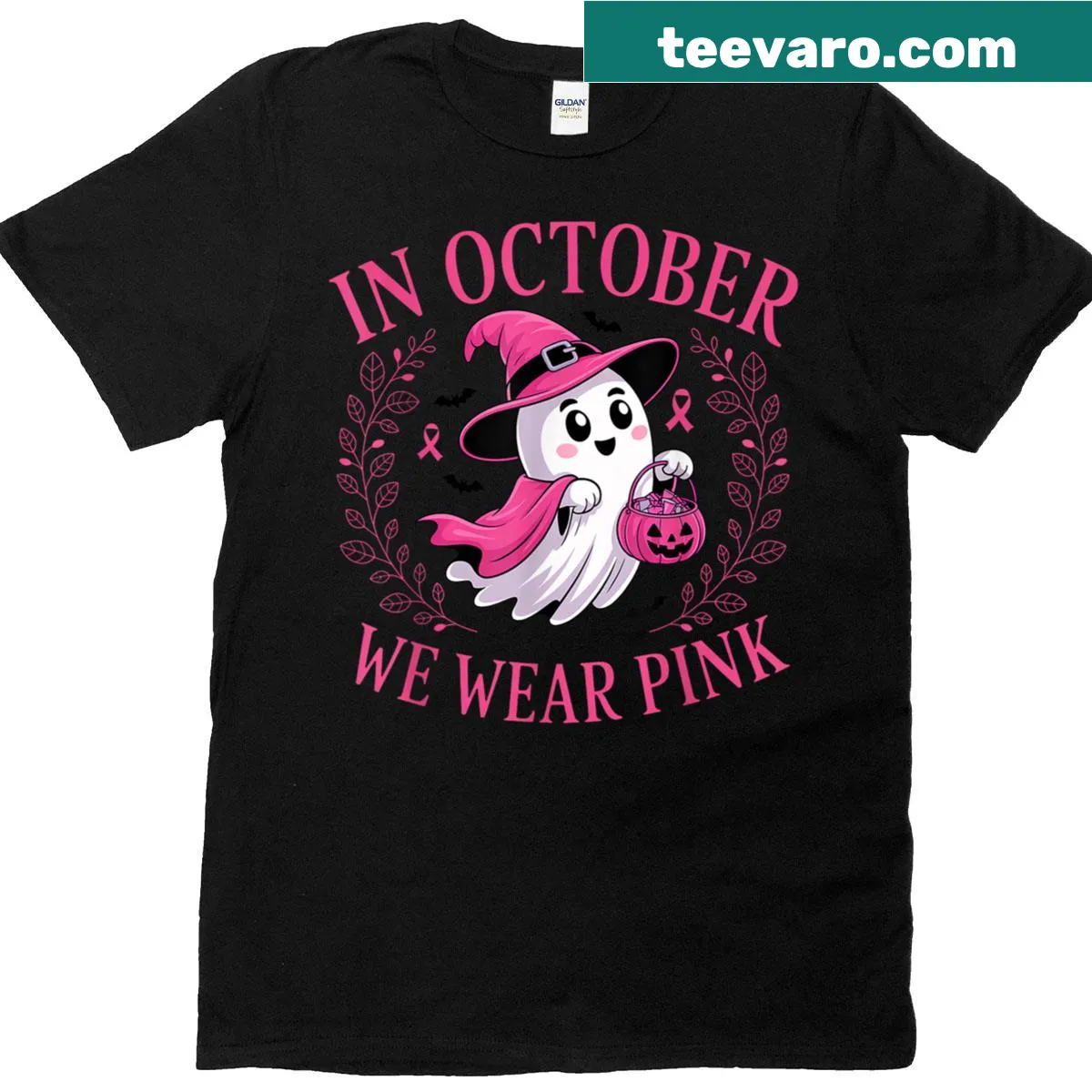 Ghost graphic T-shirt with the text 'In October We Wear Pink' — on a men's t-shirt