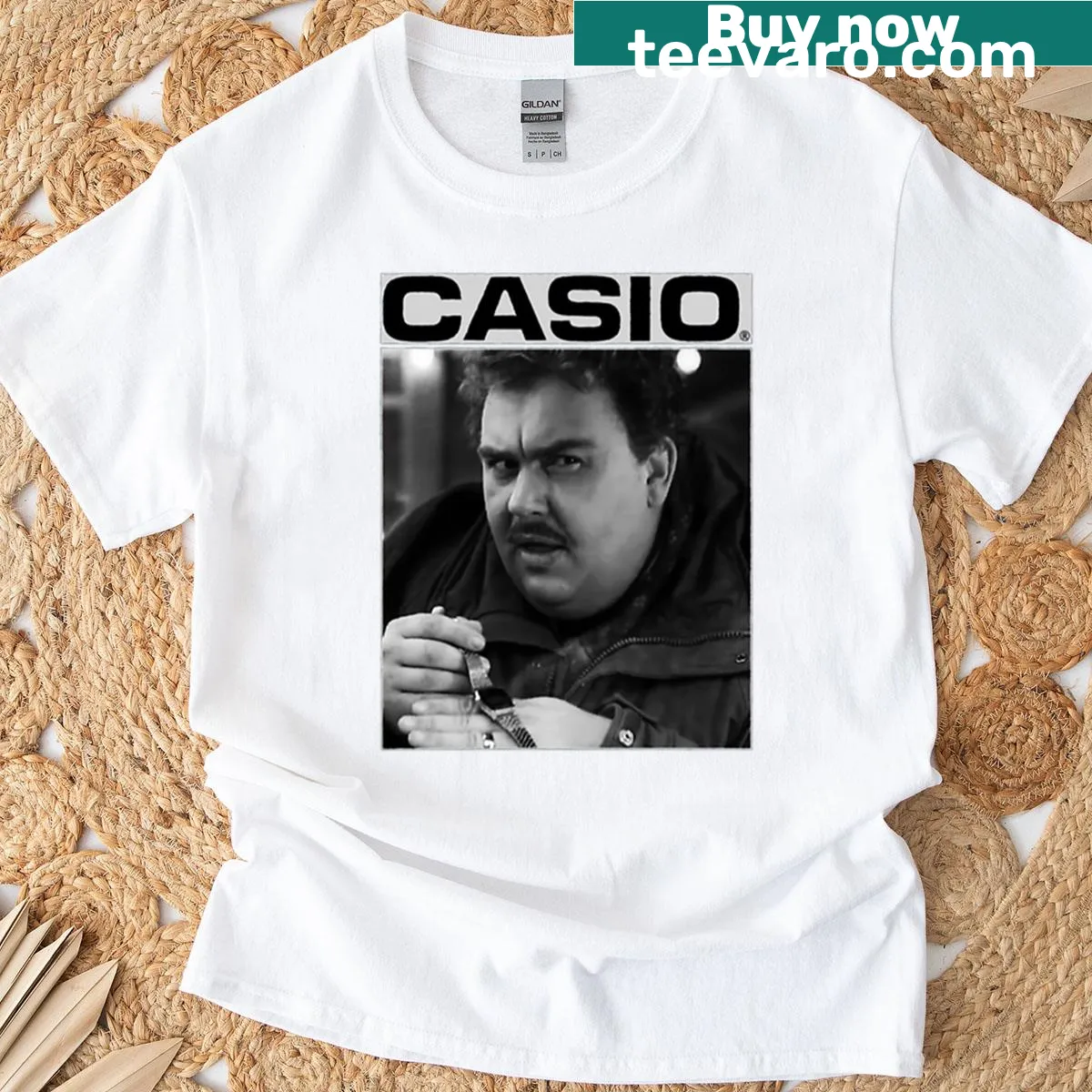 Oversized T-shirt featuring a graphic tribute to John Candy — on a men's t-shirt