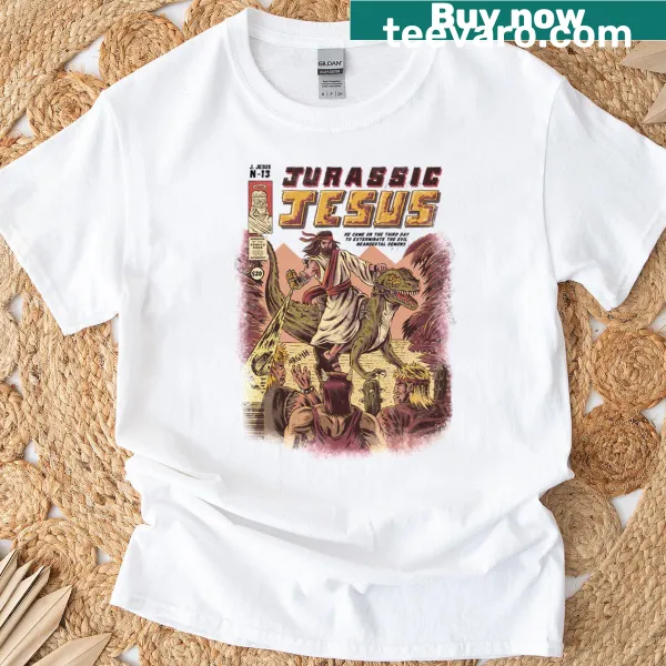 Cartoon graphic of Jesus with a dinosaur on a T-shirt.