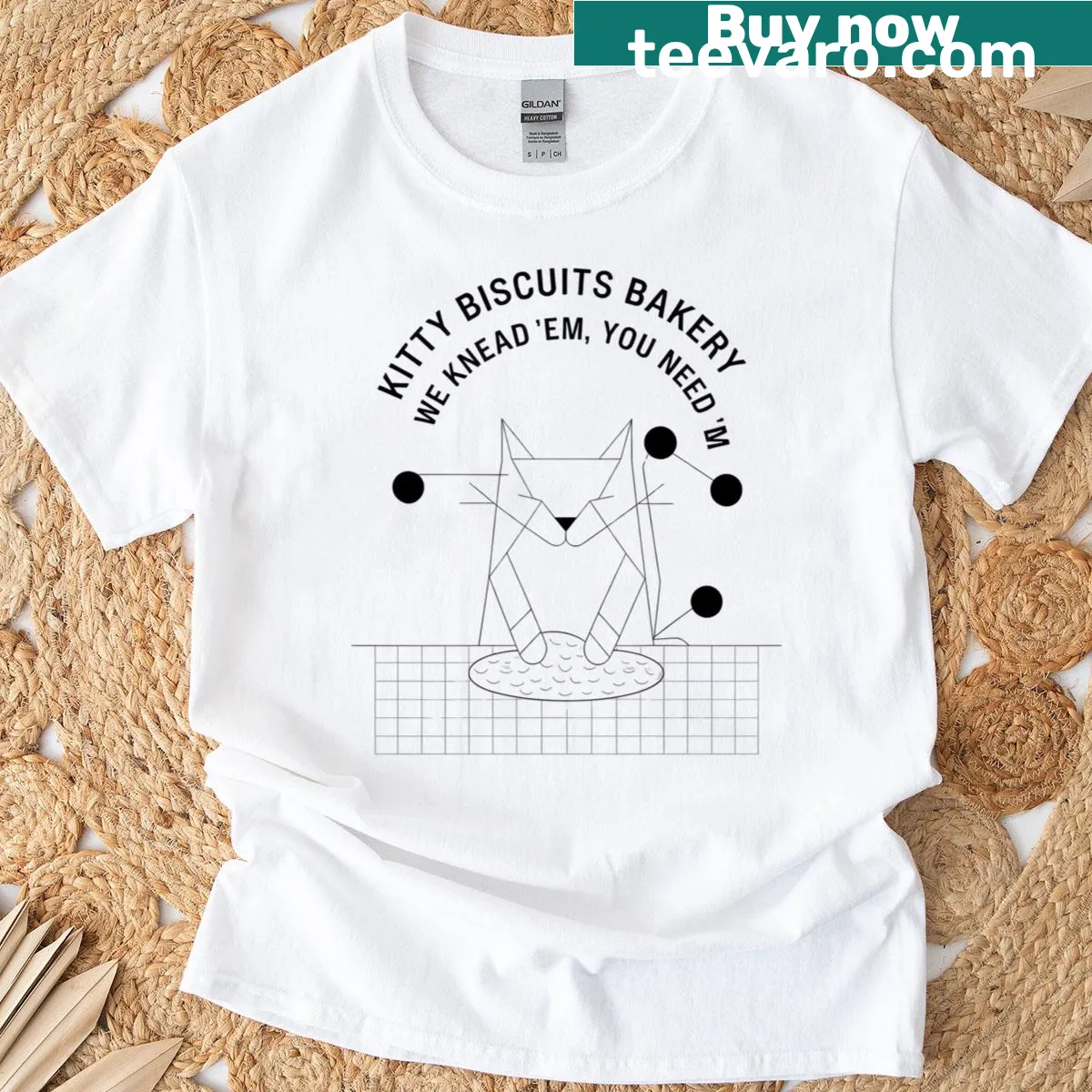 Whimsical Cat Lover baking t-shirt with paw prints and humorous text — on a men's t-shirt